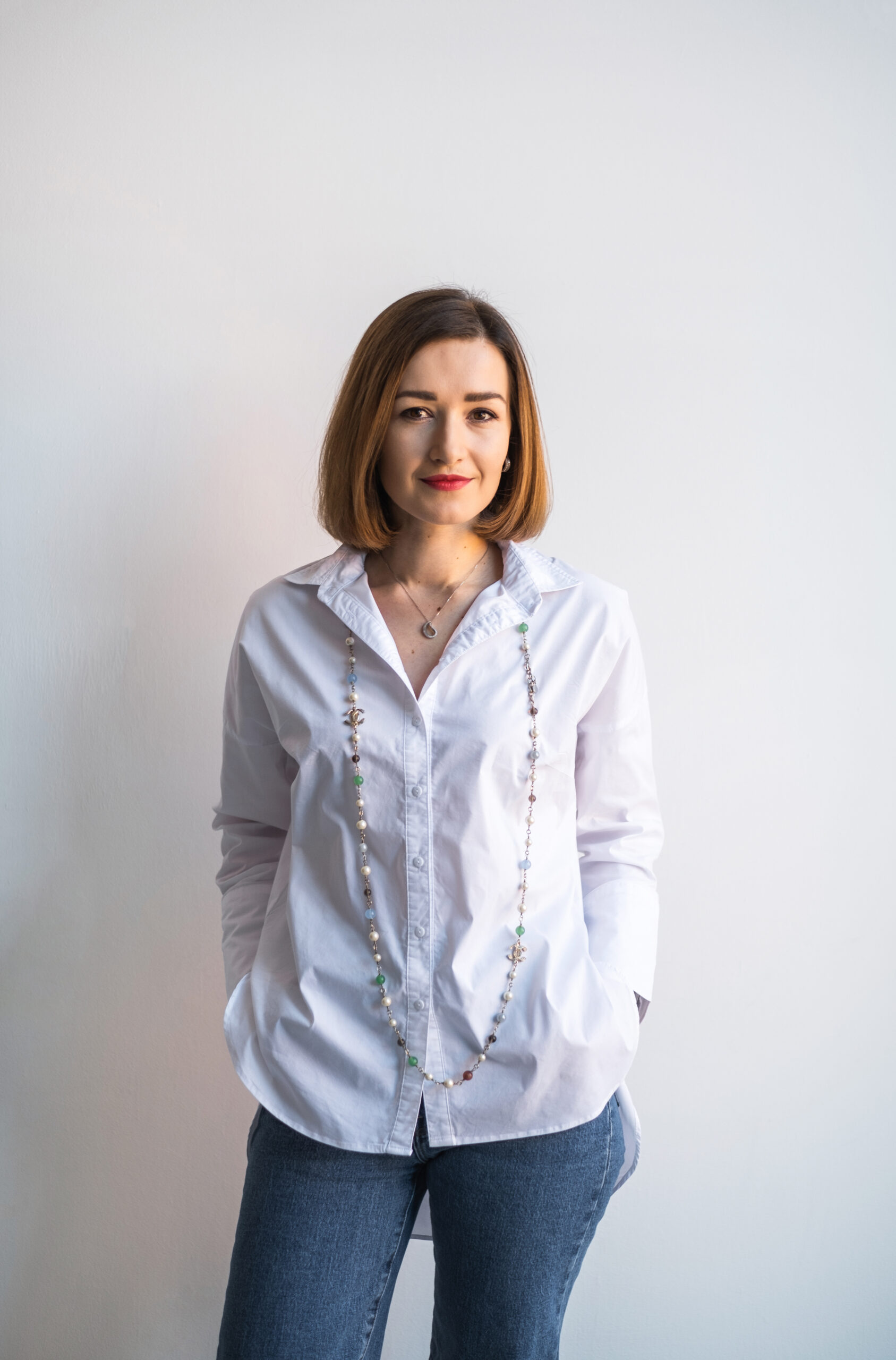 Valeria Mukhina, International Marketing Consultant and Brand Strategist, standing confidently with arms crossed